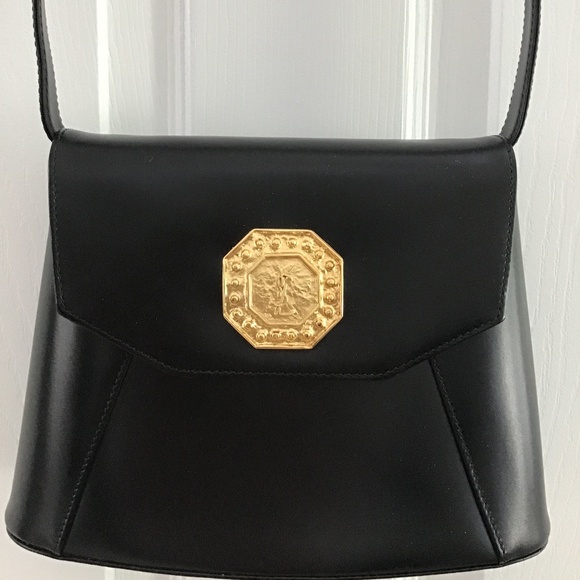 YSL Black Leather Handbag with YSL gold tone logo in the front - Picture 3 of 12